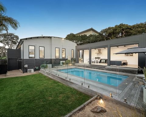 coastal home with backyard pool