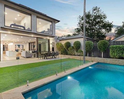 modern two storey house with pool