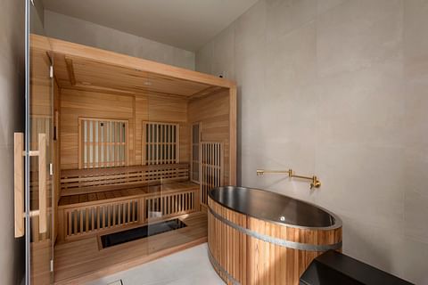 A timber-lined private sauna and wellness room