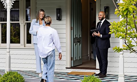 Jellis Craig property professionals meeting clients at a home
